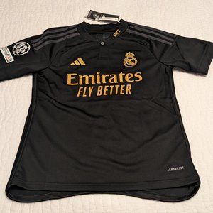 Vini Jr. Size 11-12Y Real Madrid soccer jersey.